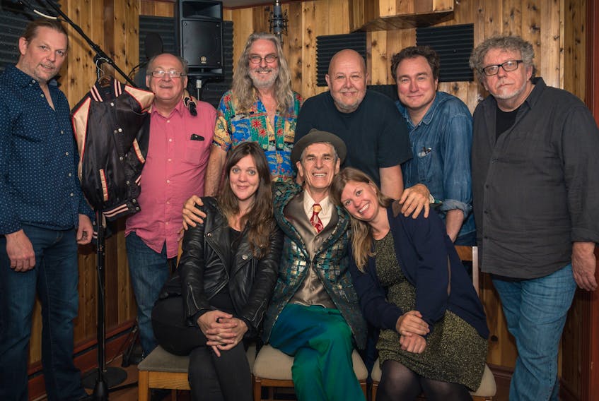 Submitted photo courtesy of Paul Kinsman
The performers on the new “Babylon Mall” track pose for a photo during the recording. Back row (from left): Billy Sutton, Boomer Stamp, Sandy Morris, Paul Kinsman, Mark Critch and Glenn Simmons. Front row (from left): Amelia Curran, Greg Malone and Geraldine Hollett.