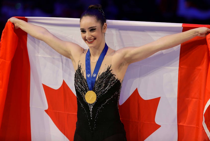Kaetlyn Osmond, originally from Marystown, shows off the gold medal she won at the 2018 world figure skating championship. Osmond has announced her retirement from competitive figure skating at the age of 23.