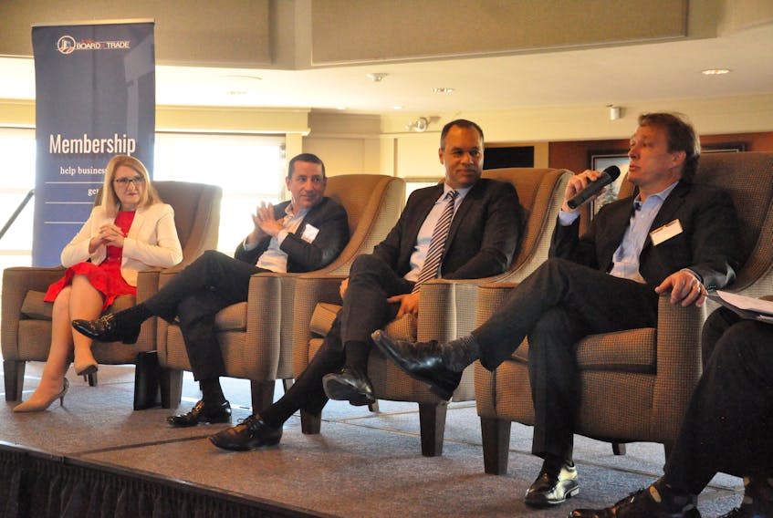 Bruce Linton (right), Canopy Growth Corp. founder, president and chair of the board of directors, speaks during a panel discussion Tuesday on the role of Canadian corporate directors in the cannabis industry. Joining Linton on the panel were (from left) Newfoundland and Labrador Liquor Corp. president and CEO Sharon Sparkes, Mitchell Osak, managing director of Grant Thornton’s strategic advisory services practice, and Peter Sloly, national security and justice leader with Deloitte.