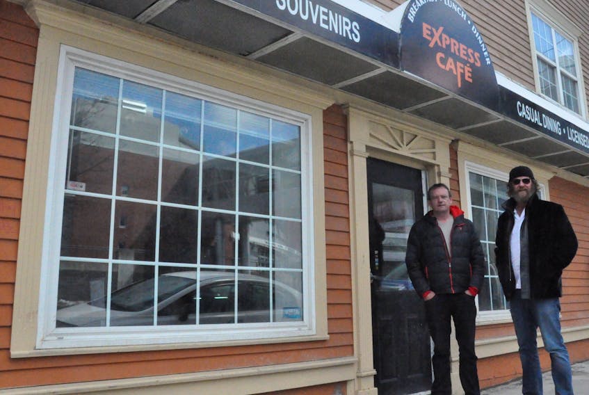 The signs above the door still read Express Café, but pending approval of Tom Nemec (left) and Chris Andrew’s application by city hall to convert the location at 79 New Gower St. into a pub, it may soon read Newfoundland Embassy.
