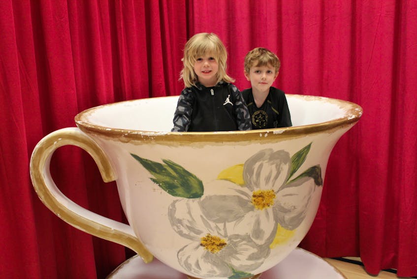 Jonah Laing, 4, and Cohen Laing, 6, of St. John’s enjoyed checking out giant artifacts from the Tall family, including a tremendous teacup, large lunchbox and massive mittens, all on display at the NewfoundlandLand touring attraction that was at Easter Seals on Mount Scio Road Friday afternoon.