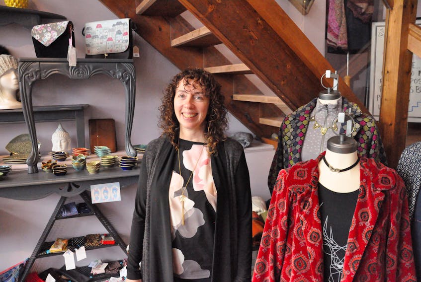 Posie Row owner Anita Carroll purchased the Tobin Building earlier this year and in addition to expanding her own store, she has turned the top three floors of the 123-year-old building into a retail co-op where small businesses and new entrepreneurs rent space from her.