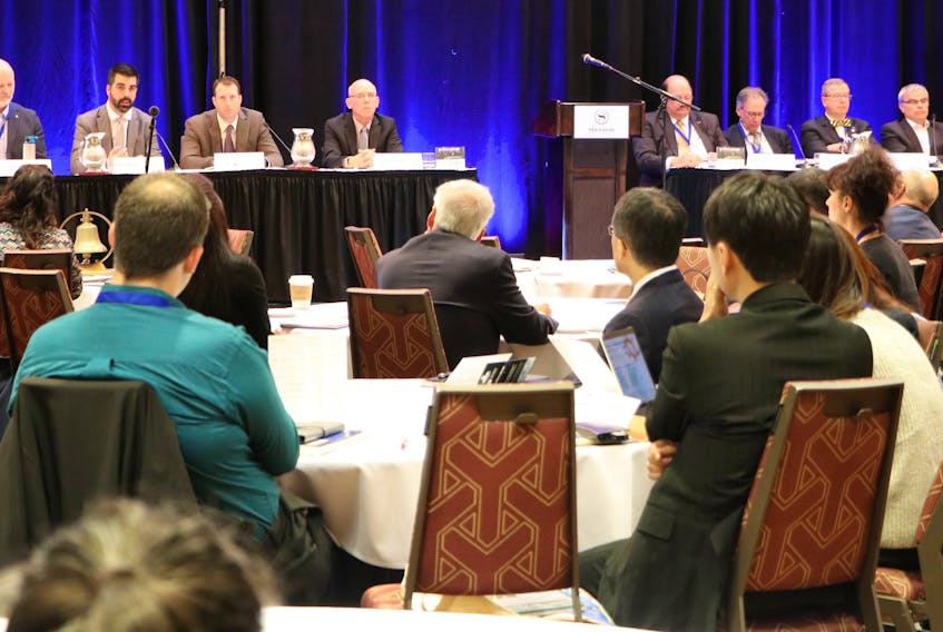 Delegates at a St. John’s conference listen to a panel discussion on subjects relating to vessel navigation in the Canadian Arctic.