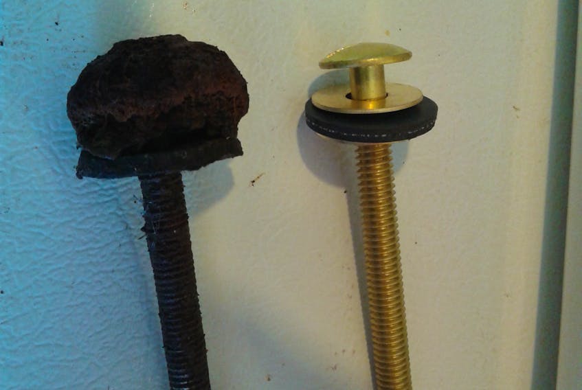 A new toilet bolt sits next to a badly corroded one, removed after only a few years use, according to John Gillett of Twillingate.