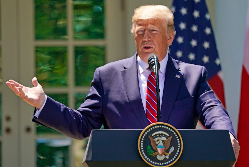 U.S. President Donald Trump speaks to reporters at the White House June 12.
