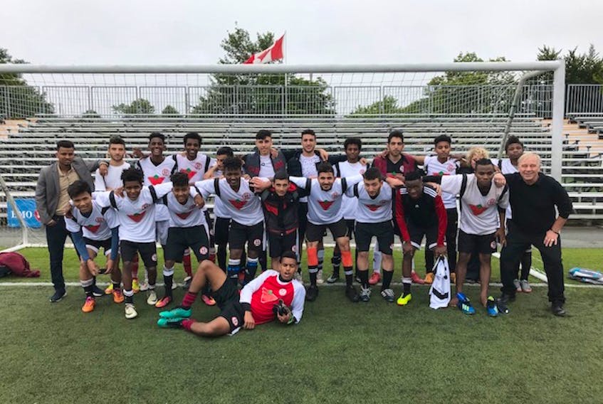 Members of Team Telegram/Canadian Tire United, a new soccer team made up of new Canadians — mainly from Syria and Sudan — celebrated its first season with a silver medal in the St. John’s Tier 2 men’s intermediate league.