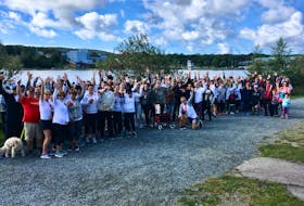 Over 100 people participated in the 5th edition of the St. John’s Multiple Myeloma March held at Quidi Vidi Lake. Pictured is David McConkey (kneeling in front of participants) kicking off the march, with the 134 participants.