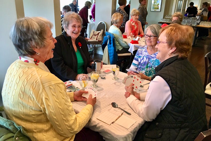 More than 140 women, including (from left) Sharon Woodford, Verna Smith, Alison Lobel and Alice Seviour, turned out recently to participate in the local bridge league at Bally Haly Golf and Curling Club. Smith teaches the game, which has grown in popularity over the years.