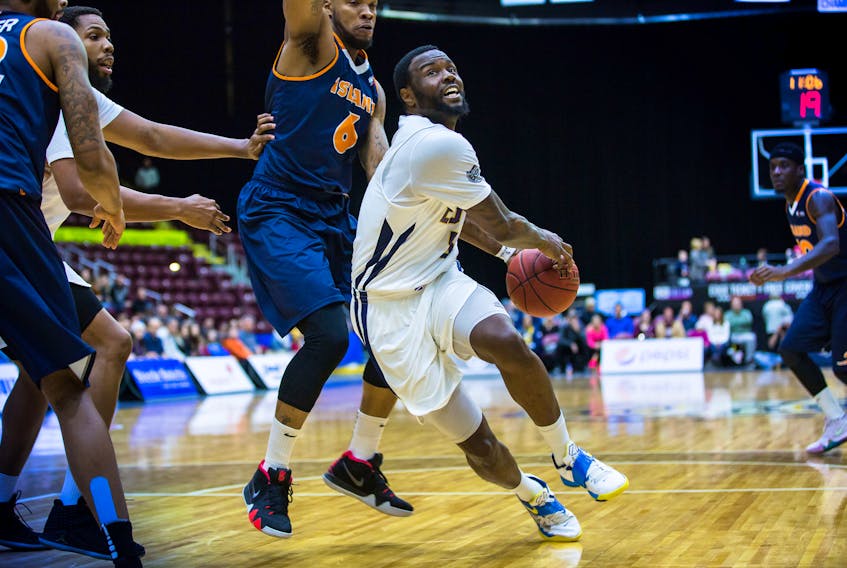 Jeff Parsons/St. John's Edge — St. John’s Edge guard Dez Lee slashes through the key past a P.E.I. Island Storm defender in a recent NBL Canada games at Mile One Centre. Coach Doug Plumb calls Lee the, “best two-way player in the league, bar none.”