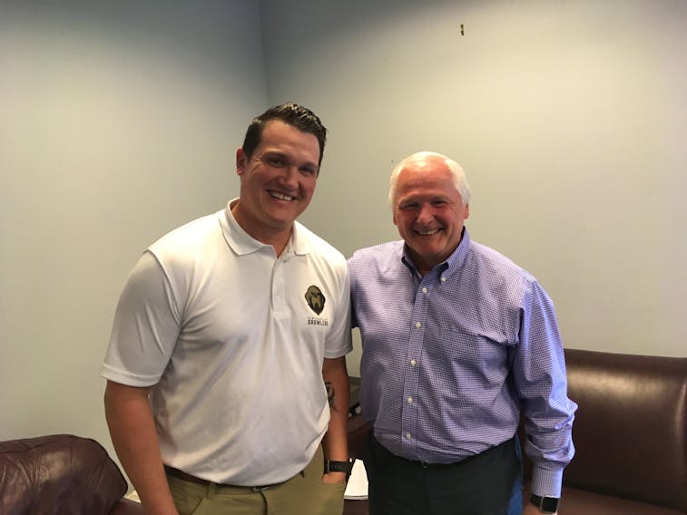 Newfoundland Growlers assistant coach John Snowden, left, shown here with Growlers’ president Glenn Stanford, is anxious to get going with the team’s inaugural season. Snowden likes how the Toronto Maple Leafs are making the minor league operations a priority.