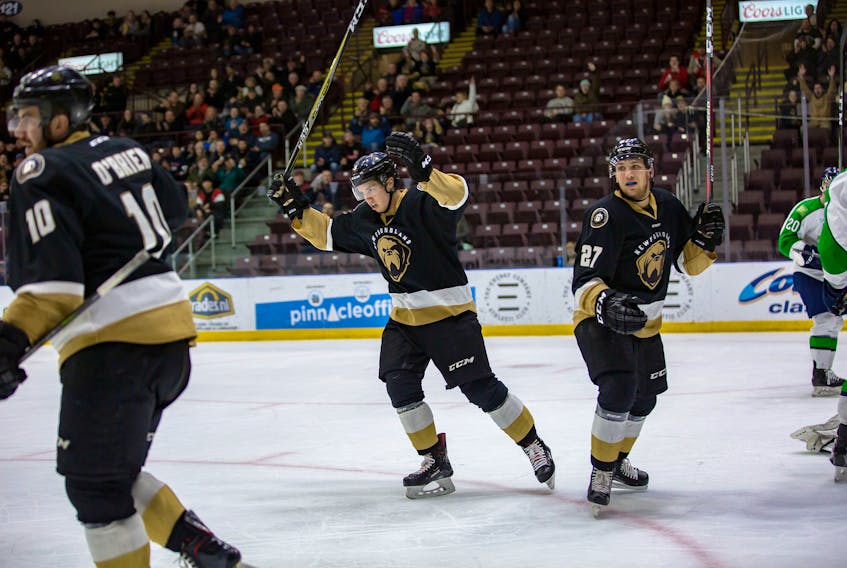 In the past month or so, Zach O’Brien, left, Marcus Power and Matt Bradley (27) have formed the Newfoundland Growlers’ top line.