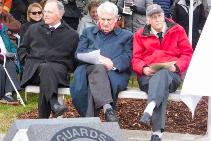 In this Oct., 2018 file photo, Guards Athletic Association chairman Bill Campbell (left) is joined by Miller Ayre (left) and Ed Roberts at the unveiling of the Ayre Athletic Grounds Memorial in St. John’s. Campbell died Monday. He was 78. — File/Submitted