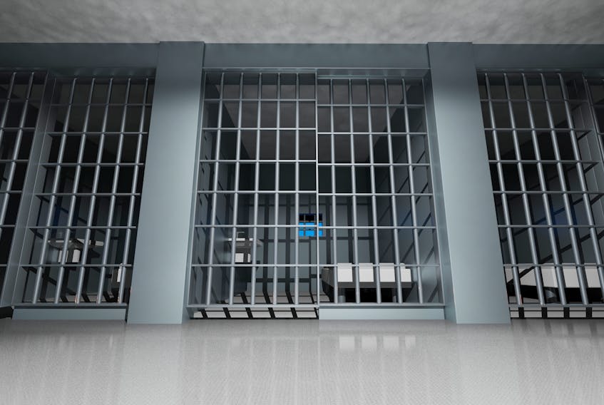 Interior of a prison showing cells.