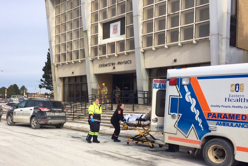 Eastern Health paramedics load a man into an ambulance following an incident in a MUN Chemistry-Physics lab.