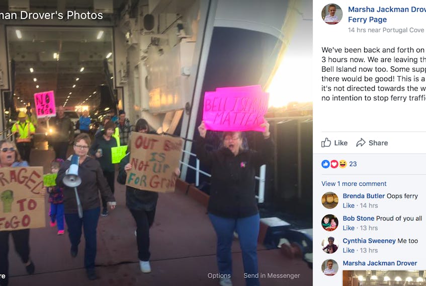 Protesters stand on the dock of The Legionnaire in a screengrab from Facebook.