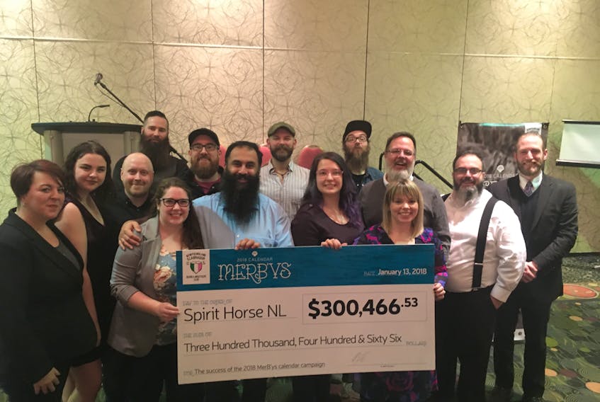 Members of the Newfoundland and Labrador Beard & Moustache Club present a cheque for $300,466.53 to Erin Gallant of Spirit Horse NL. The money was raised through the popular MerB’ys 2018 calendar sales, which featured bearded men dressed as mermen. Spirit Horse NL aims to enhance mental health and life skills through therapeutic interaction with horses.