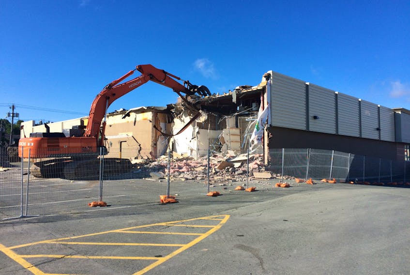 The demolition of the iconic retail building at the end of the Avalon Mall Shopping Centre parking lot near the intersection of Columbus Drive/Freshwater Road /Kenmount Road has begun.
