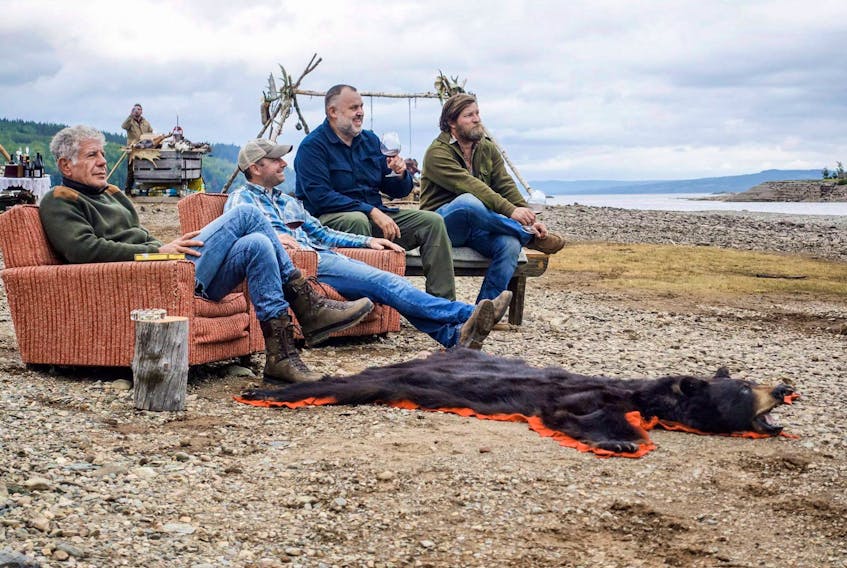 Anthony Bourdain (left) is shown in this undated handout photo posted on the “Anthony Bourdain: Parts Unknown” Facebook page for an episode featuring Newfoundland’s local cuisine and landscapes.