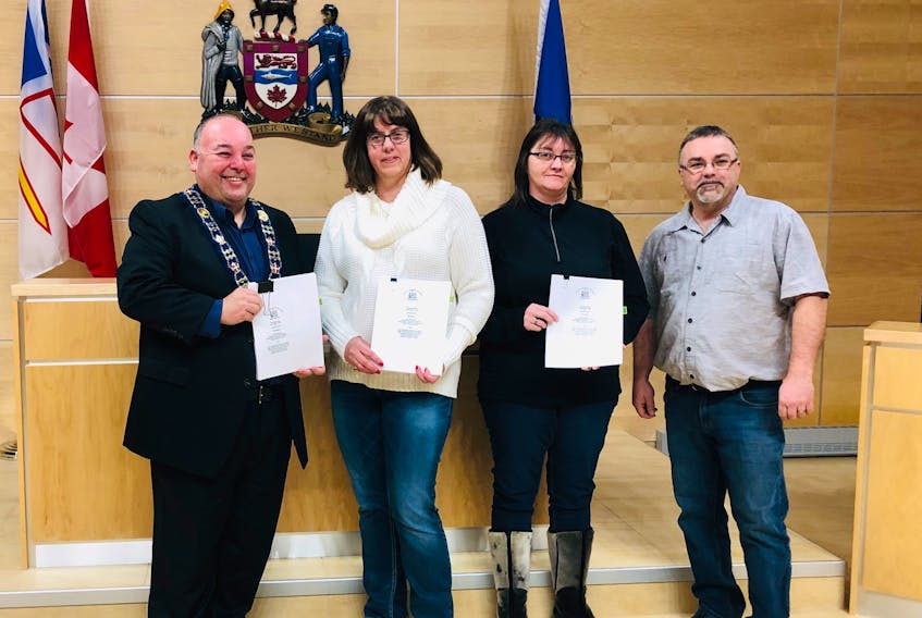 Conception Bay South Mayor Terry French with CUPE Local 3034 president Terri-Lynn Cooper and union executives, Stephanie Lear and Mike Neary, after both parties signed a new collective agreement.