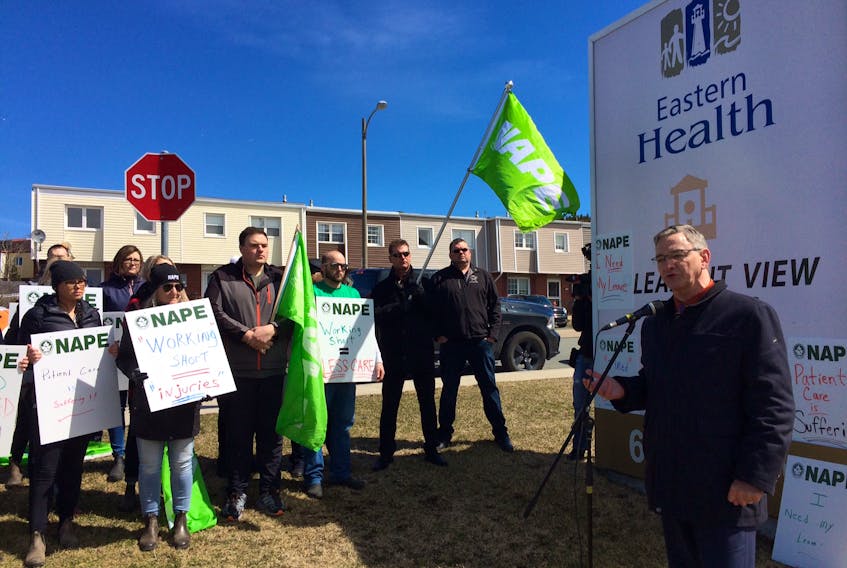 NAPE president Jerry Earle addresses workers at Pleasant View Towers during a noon-hour demonstration in St. John's.