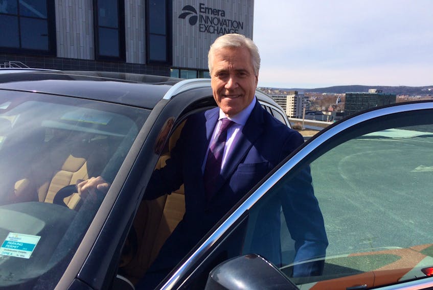 Premier Dwight Ball gets into a vehicle outside the Emera Innovation Exchange at Memorial University's Signal Hill Campus. Ball told reporters that the provincial election would occur before the school year ends on June 27.
