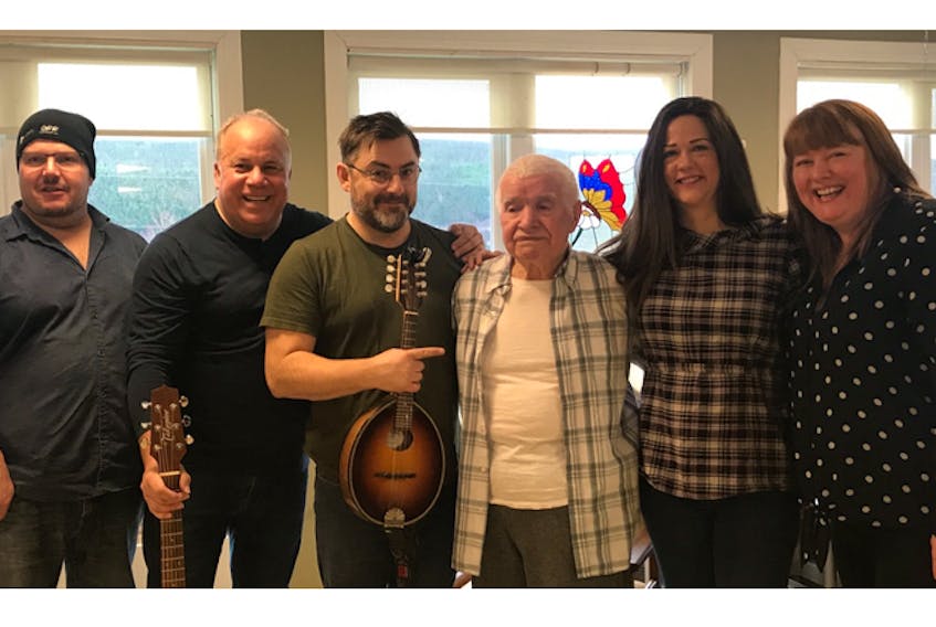 A few weeks ago, a group of local musicians visited the Agnes Pratt Seniors Home in St. John’s to perform for their friend, Stevie Lane. From left, Carl Peters and Bob Taylor of the band Wabana, Larry Foley of The Punters, Lane, and friends Julie Miller and Brenda O’Reilly, owner of O’Reilly’s Irish Newfoundland Pub.