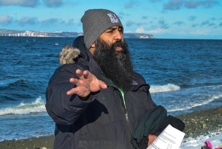 Hassan Hai, president of the Newfoundland and Labrador Beard and Moustache Club and a former MerB'y calender model, offers some instructions ahead of the 2018 Project Kindness Polar Bear Swim at Topsail Beach. This year's swim is scheduled for New Year's Day at noon for a 12:30 p.m. plunge. — Andrea Edwards Photography