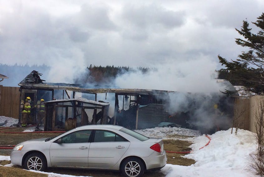 This garage, located behind a home on the Back Line in Goulds was destroyed by a fire that was reported to the St. John's Regional Fire Department around 2 p.m. When The Telegram arrived on the scene, smoke was billowing heavily from the structure.
Details are still emerging on the fire call at this time and will be updated when they become available.