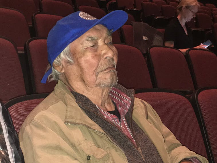Innu elder Sebastian Penunsi awaits his call to the witness stand at the Muskrat Falls Inquiry, waiting in the seats of the Lawrence O’Brien Arts Centre in Happy Valley-Goose Bay. Penunsi was born in Labrador in 1930 and spoke to the history of use of the area of the lower Churchill River, the area of the Muskrat Falls hydro project.