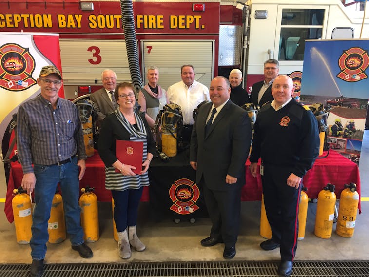 The St. Shott's Volunteer Fire Department was presented with eight sets of Self Contained Breathing Apparatus (SCBA) and 16 aluminum cylinders from the Town of C.B.S. on Tuesday night. The old equipment had been upgraded by the C.B.S. fire department and after a motion by council, was awarded to St. Shott's. On hand for the presentation were (front, from left): Albert Molloy (St. Shott's Fire Department chief), Madonna Hewitt (St. Shott's mayor), Terry French (Conception Bay South mayor), John Heffernan (Conception Bay South Fire Department chief) and (back, from left): Richard Murphy (C.B.S. deputy mayor), and councilors Christine Butler, Kirk Youden, Cheryl Davis and Darrin Bent.