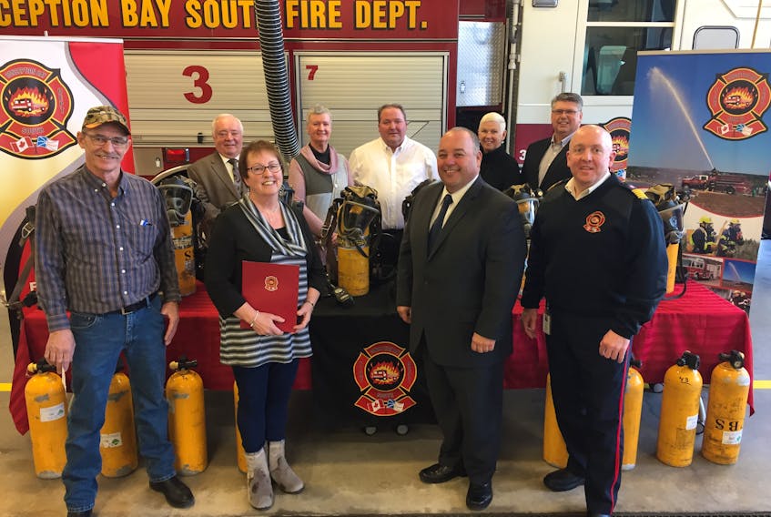 The St. Shott's Volunteer Fire Department was presented with eight sets of Self Contained Breathing Apparatus (SCBA) and 16 aluminum cylinders from the Town of C.B.S. on Tuesday night. The old equipment had been upgraded by the C.B.S. fire department and after a motion by council, was awarded to St. Shott's. On hand for the presentation were (front, from left): Albert Molloy (St. Shott's Fire Department chief), Madonna Hewitt (St. Shott's mayor), Terry French (Conception Bay South mayor), John Heffernan (Conception Bay South Fire Department chief) and (back, from left): Richard Murphy (C.B.S. deputy mayor), and councilors Christine Butler, Kirk Youden, Cheryl Davis and Darrin Bent.