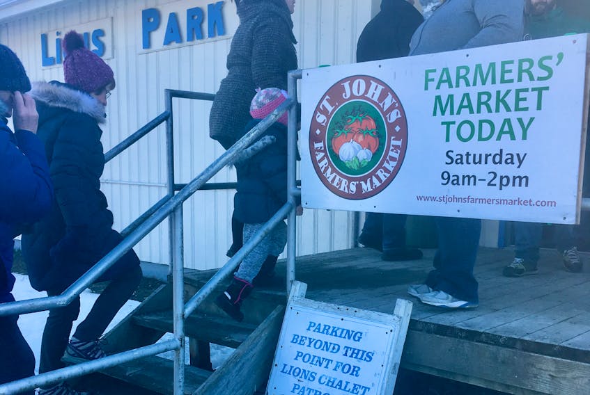 There was a constant line of people going in and out of the Lions Club Chalet in S. John’s on Saturday morning for the first winter market of the year.
