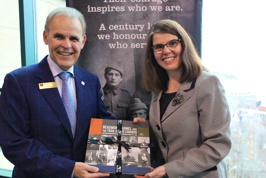 CIBC senior vice-president and Eastern Canada region head Sylvain Vinet (left) and The Rooms director Anne Chafe at the Monday evening launch of the companion catalogue for the exhibition of the same name, “Beaumont-Hamel and the Trail of the Caribou.”