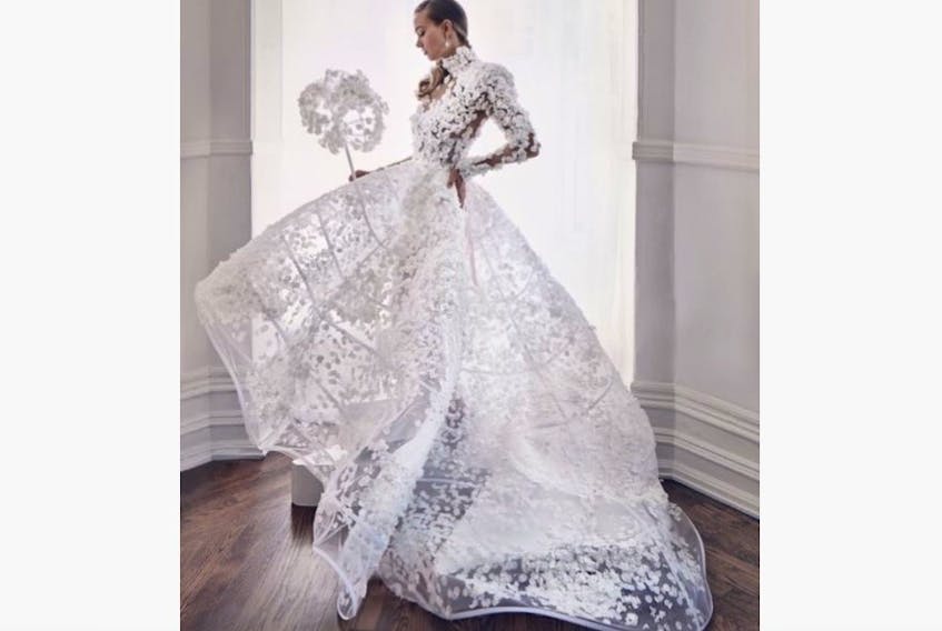 St. John's fashion designer Rod Philpott's gown, created from toilet paper for the 2020 Cashmere Collection fashion show and seen here on Toronto model Arline Malakian, was singled out by the event hosts for its stunning detail.