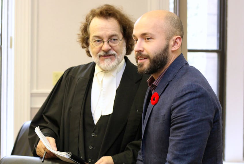 Curtis Wasylow (right) with his lawyer, Bob Buckingham, minutes after he was declared not guilty of marijuana trafficking in Newfoundland and Labrador Supreme Court in St. John’s Tuesday.