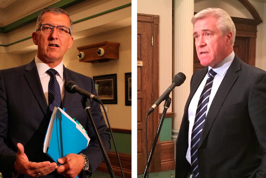 Opposition Leader Paul Davis (left) and Premier Dwight Ball. — Telegram file photos