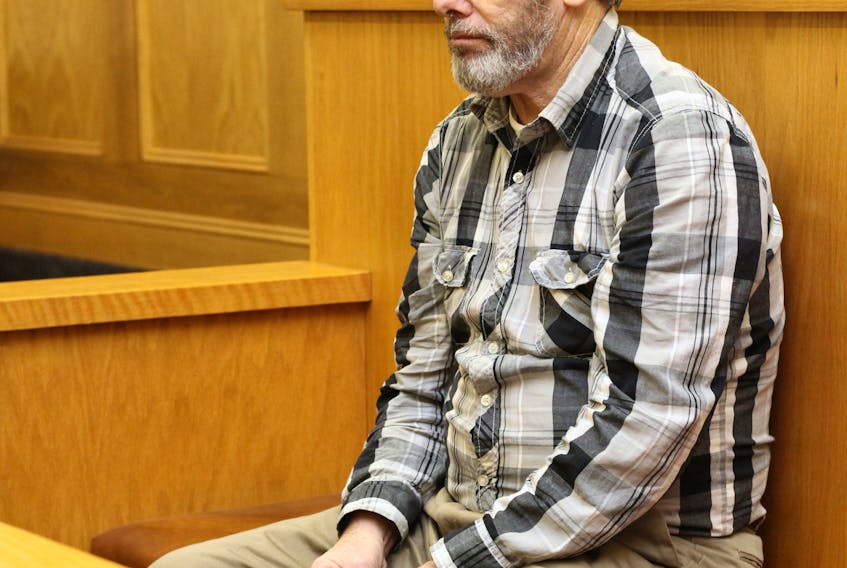 Chris Snow, 68, of St. John’s sits in the dock in Newfoundland and Labrador Supreme Court Wednesday.