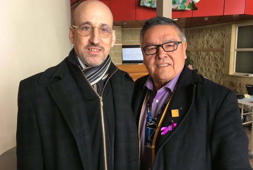Chief Jean-Charles Piétacho of the Conseil des Innu d’Ekuanitshit (right) and lawyer for the Conseil des Innu d’Ekuanitshit, David Schulze of Dionne Schultz, stand outside the hearing room in Happy Valley-Goose Bay on Monday after Piétacho’s testimony.