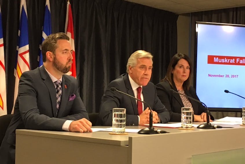 Justice Minister Andrew Parsons (right), Premier Dwight Ball and Natural Resources Minister Siobhan Coady announce details of the Muskrat Falls inquiry Monday at Confederation Building in St. John's.