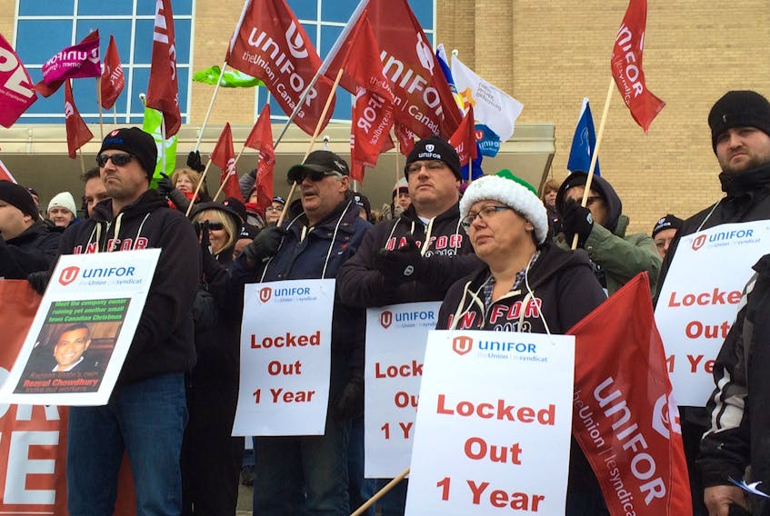 Locked out workers from DJ Composites in Gander rallied at Confederation Building in St. John's Tuesday.