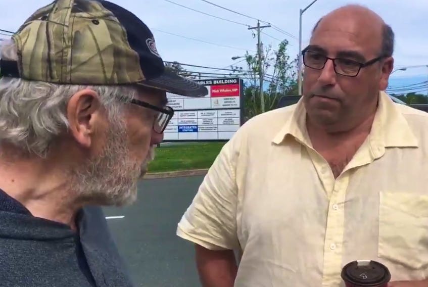 This screengrab from a Telegram video shows Andy Wells (left) and Paul Lane in a verbal exchange July 20. — Ashley Fitzpatrick/The Telegram