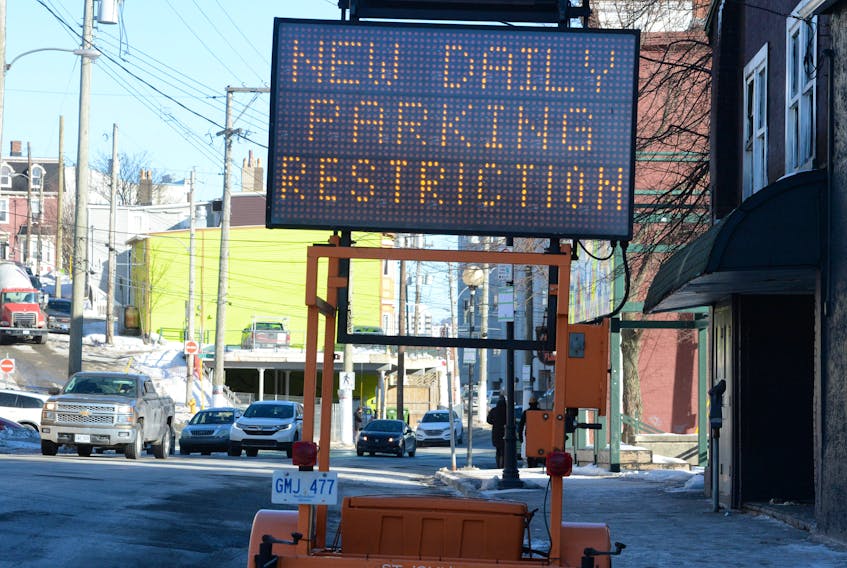 A City of St. John’s portable traffic information sign at the start of Duckworth Street where it meets with Queen’s Road in downtown St. John’s was activated Tuesday morning to inform motorists of the new winter parking regulations.