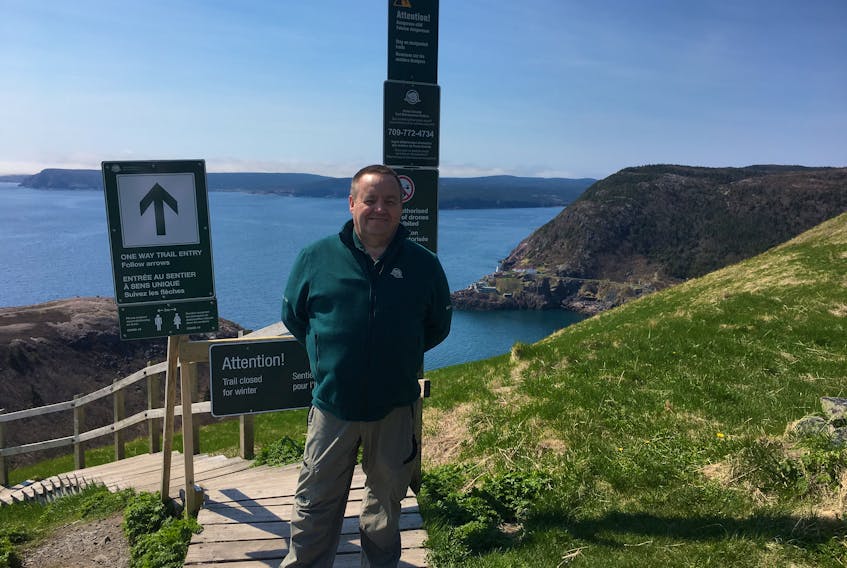 Bill Brake, Parks Canada’s eastern Newfoundland and Labrador field unit superintendent, at the new beginning of the North Head Trail on Signal Hill Friday. —