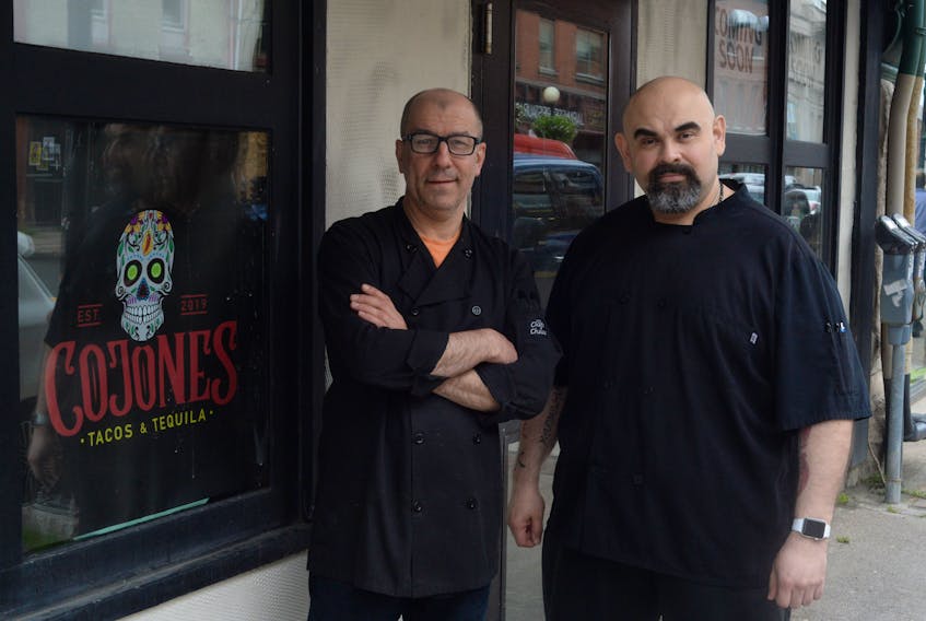 Chefs Gregory Berzinsky (left) and Luis Alcazar are shown outside the soon-to-be-opened Mexican restaurant Cojones Tacos & Tequila. Located on the ground floor of the Franklin Hotel on Water Street in St. John's, it's expected to be open for business later this month.