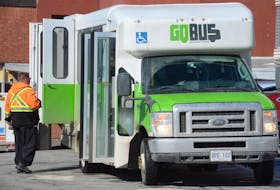 A GoBus collects passengers from the Leonard A. Miller Centre on Forest Road in St. John's.