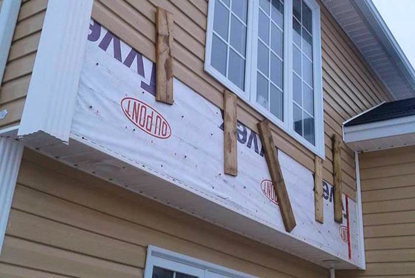 Peter and Karen Yetman’s house in Paradise had some siding peel off as a result of the high winds on Wednesday. Even stronger winds are expected to buffet the island tonight and into Thursday.