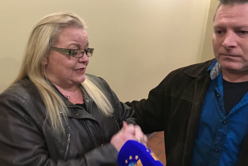 Darlene Dinn and Billie Jo Head, brother of Victoria Head, react outside the courtroom Saturday after Steve Bragg is charged with second-degree murder.