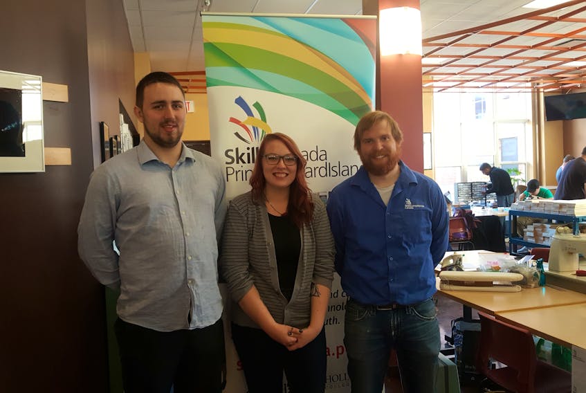 Skills Canada P.E.I. alumni Mark Shaw, from left, Nadia Gaudet, and Patrick LeClair at the Repair Café hosted by Skills Canada P.E.I. as part of Holland College’s recent Campus Tour Day. (SUBMITTED PHOTO)