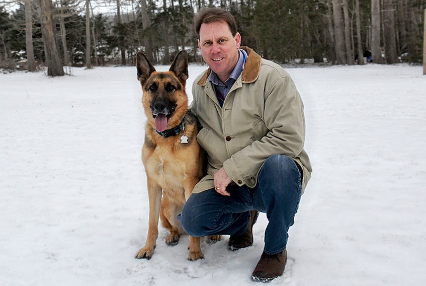 Opposition Leader James Aylward enjoys some winter weather with his dog, Axle, at his home in Stratford. Aylward says his biggest highlight of 2017 was winning the leadership of the PC party.  ©THE GUARDIAN