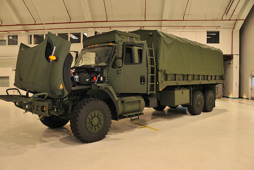 A Militarized Commercial-Off-The-Shelf (MilCOTS) truck, part of the Army Reserve 36 Signal Regiment's vehicle list, and part of the Canadian Forces' Medium Support Vehicle System (MSVS). ©Cpl. Beaudoin